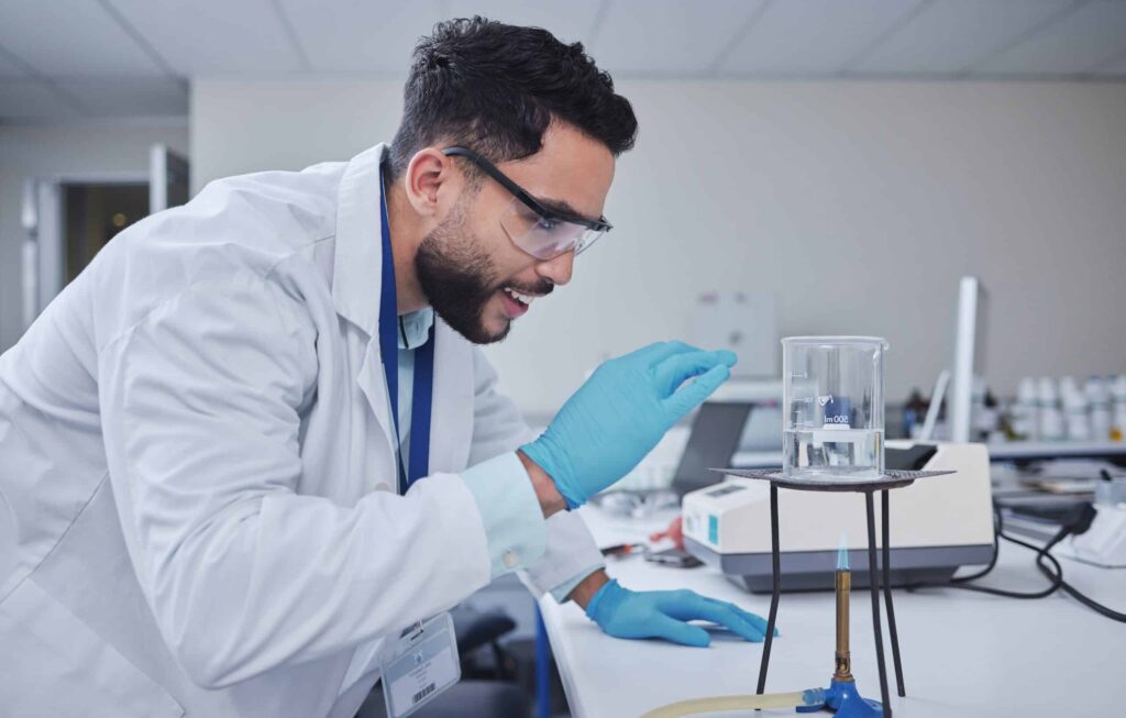 Laboratory performing chemical testing to evaluate material degradation and behavior