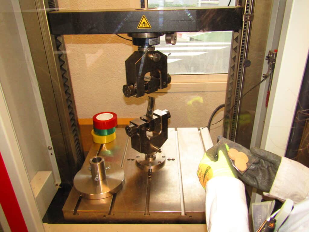 Testing equipment subjecting bonded samples to thermal shock cycles to simulate real service conditions