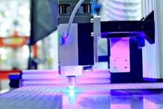 Fabricación de prototipos mediante impresión 3D y testeo de un robot de grabado láser