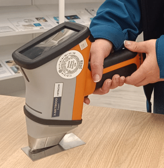 Technician performing ICP analysis to determine the chemical composition of industrial materials