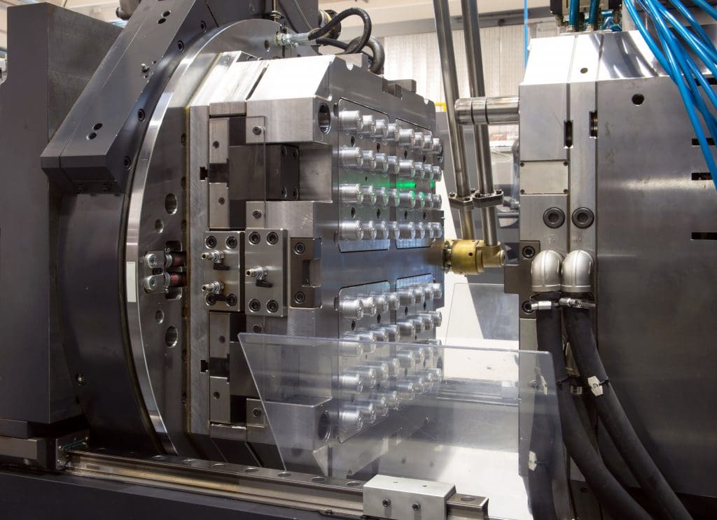 Fabricación de Producto Molde de inyección multicavidad montado en máquina para producción de series industriales