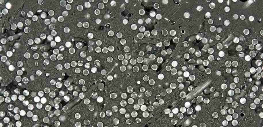 Polymer microstructure showing dispersion and agglomeration of filler particles