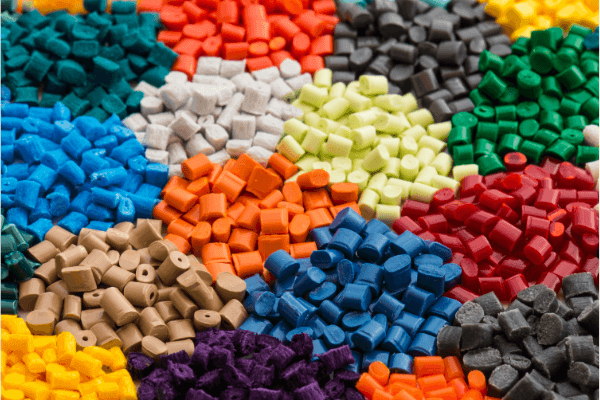 Plastic pellets in different colors for polymer material testing