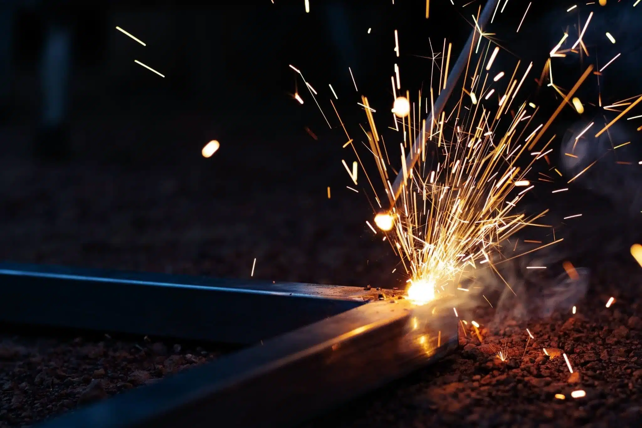 Sparks given off while welding a metal part