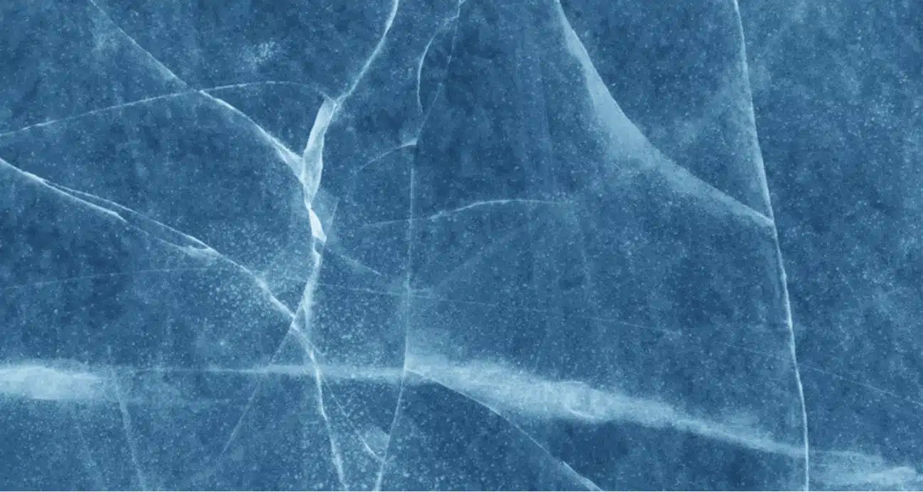 Close-up of a surface with scratch marks like those to be prevented on glass