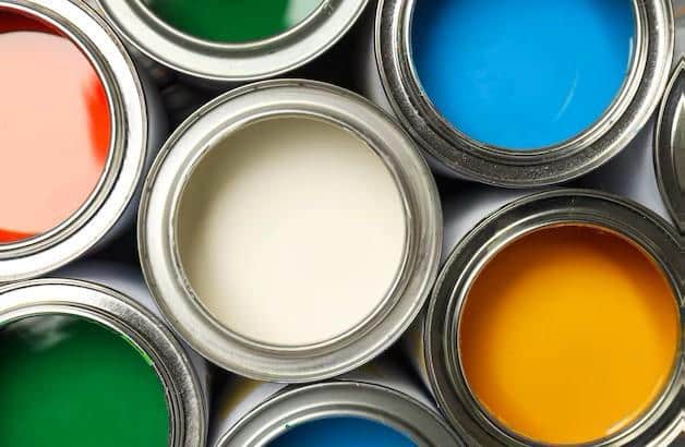 Open cans of industrial paints used for chemical analysis and composition verification