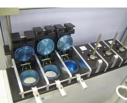 Analysis of gases released from plastics and REACH compliance Micro chamber sample holders with plastic samples to analyse emitted gases