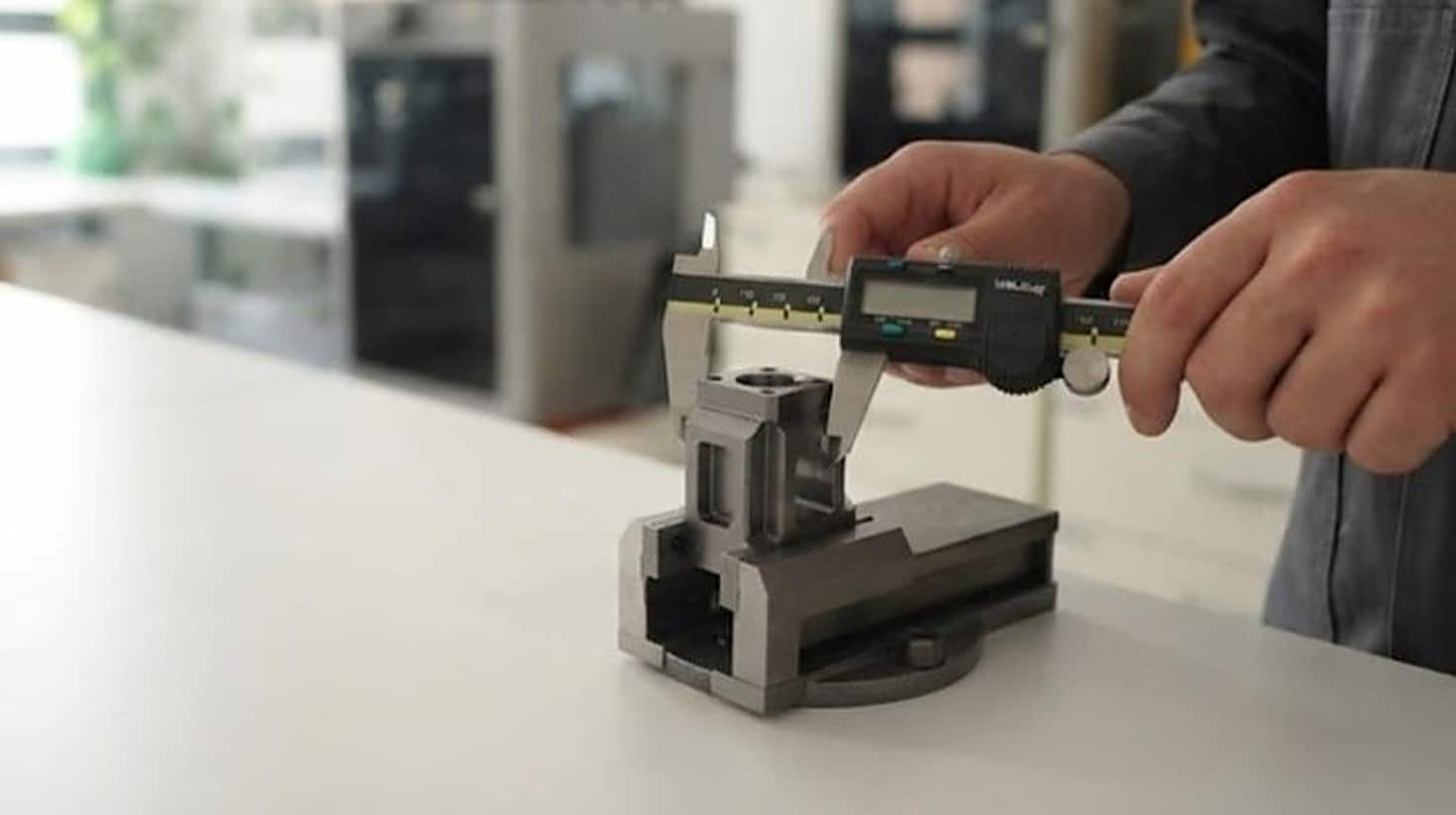 Design and manufacture of a scale prototype to present a product idea to investors Caliper measurement of a scale prototype to verify tolerances
