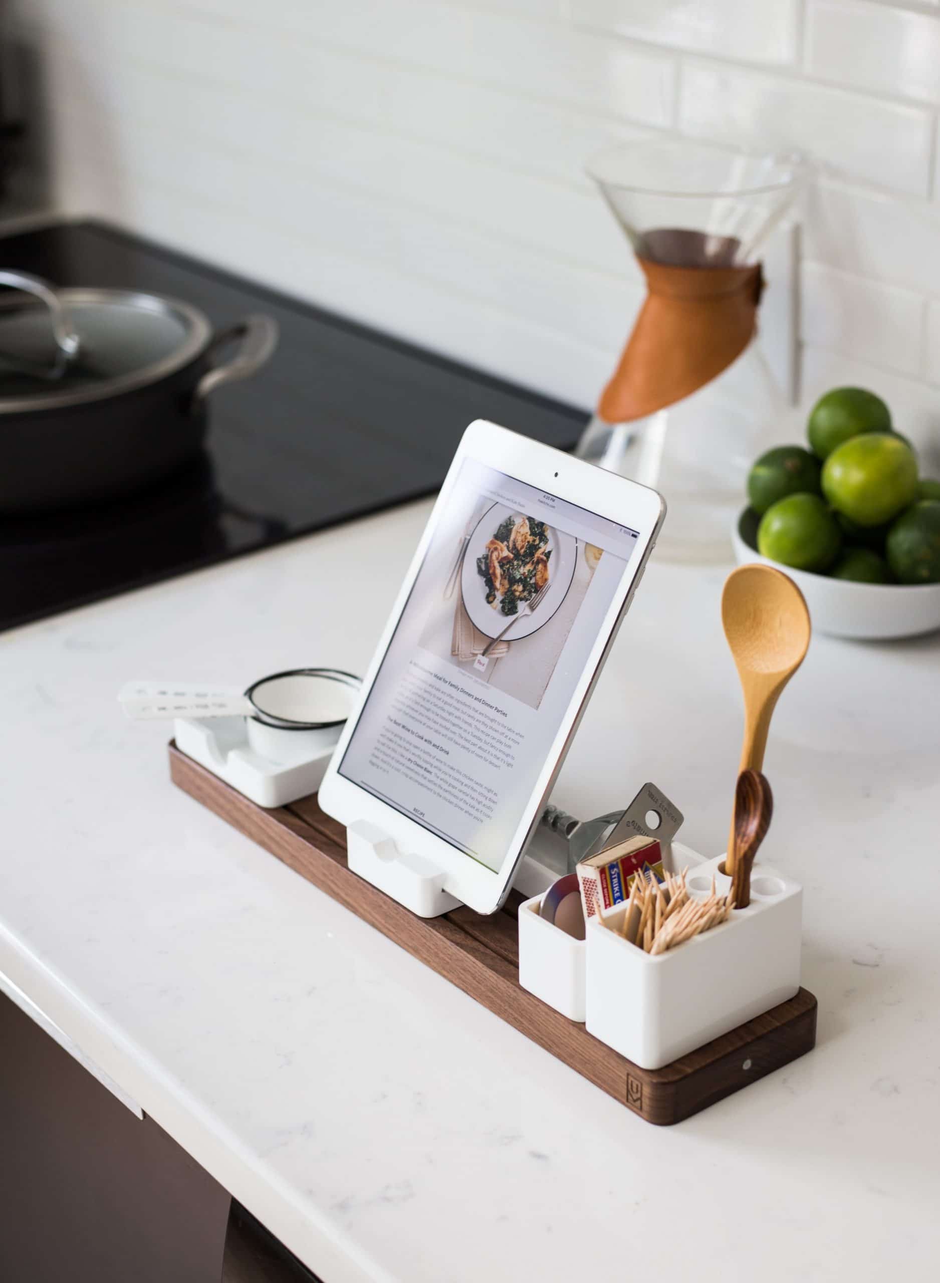 Tablet on a stand on a kitchen worktop
